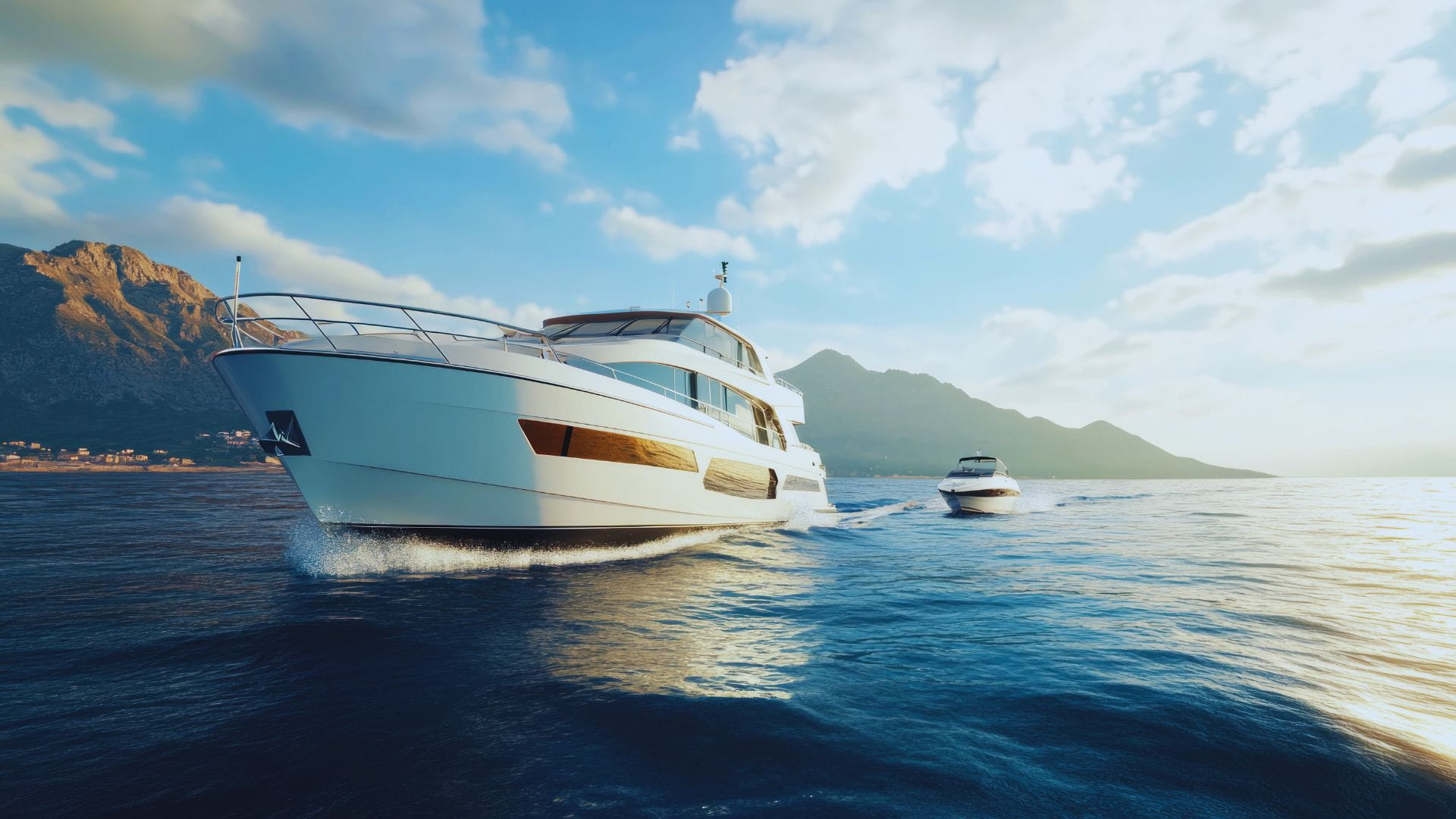 Luxury motor yacht cruising along a mountainous coastline at sunset, a destination accessible by private charter flight and helicopter transfer.